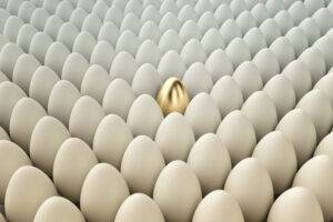 Conceptual Illustration. Golden egg among regular eggs. - image  on http://cavemaninasuit.com